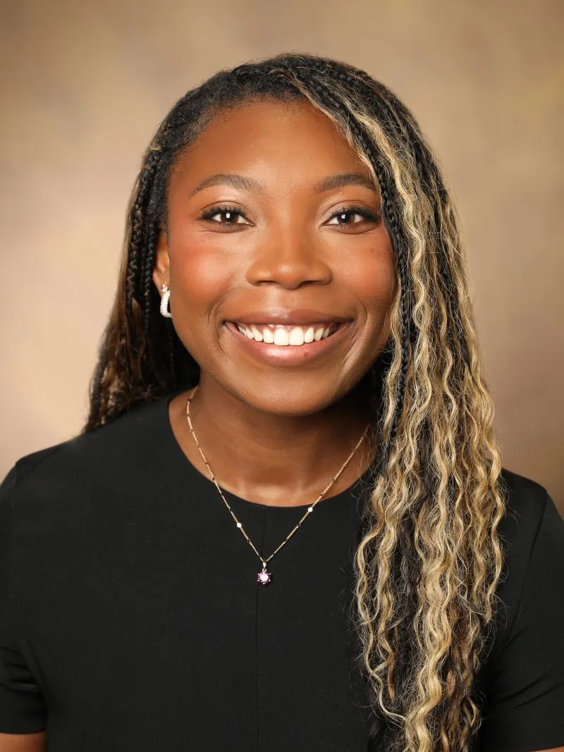 Dr. Kellsa Mbah headshot